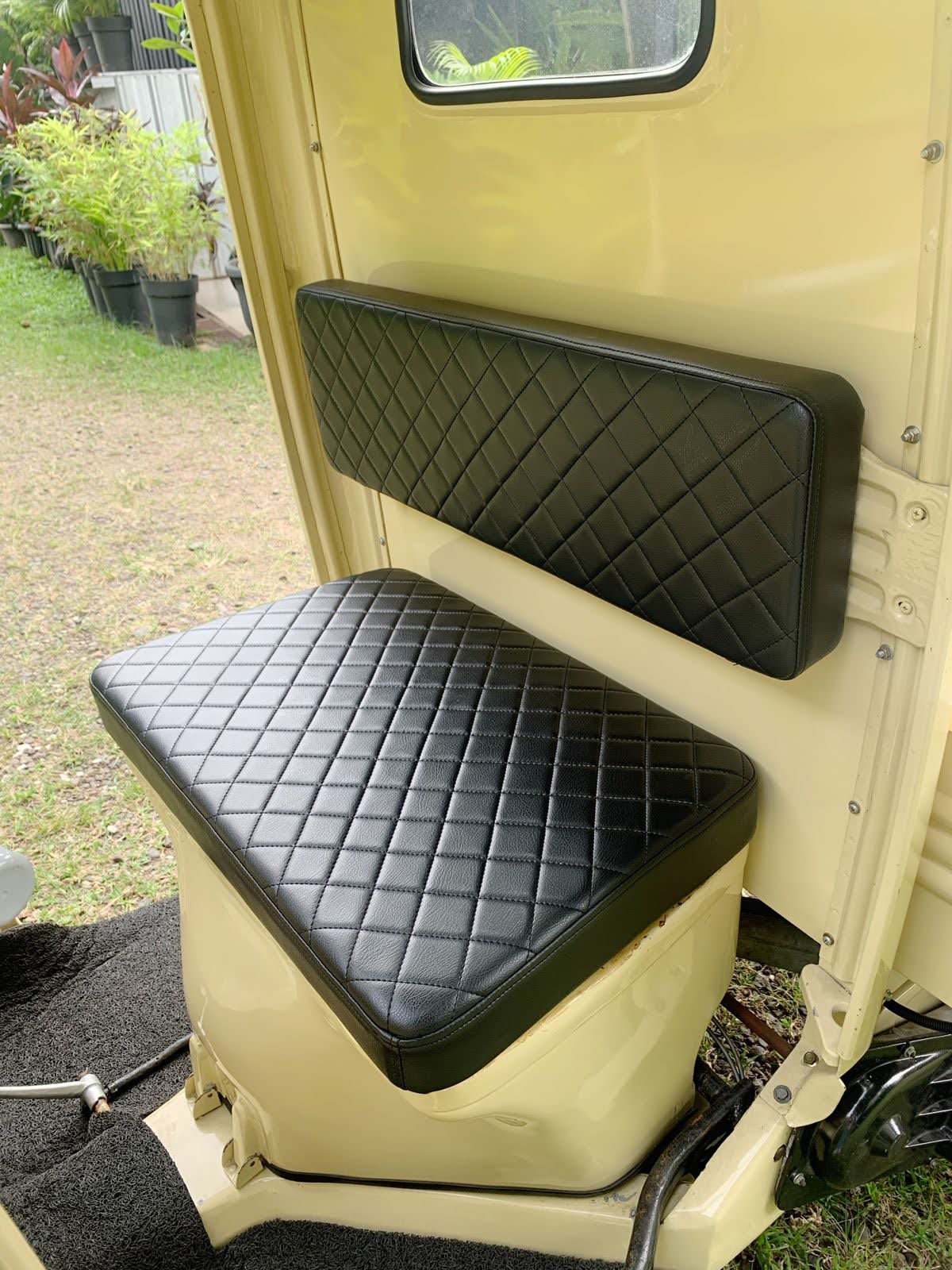 Rear pickup bed of Ape Bajaj Cream Pickup for city delivery